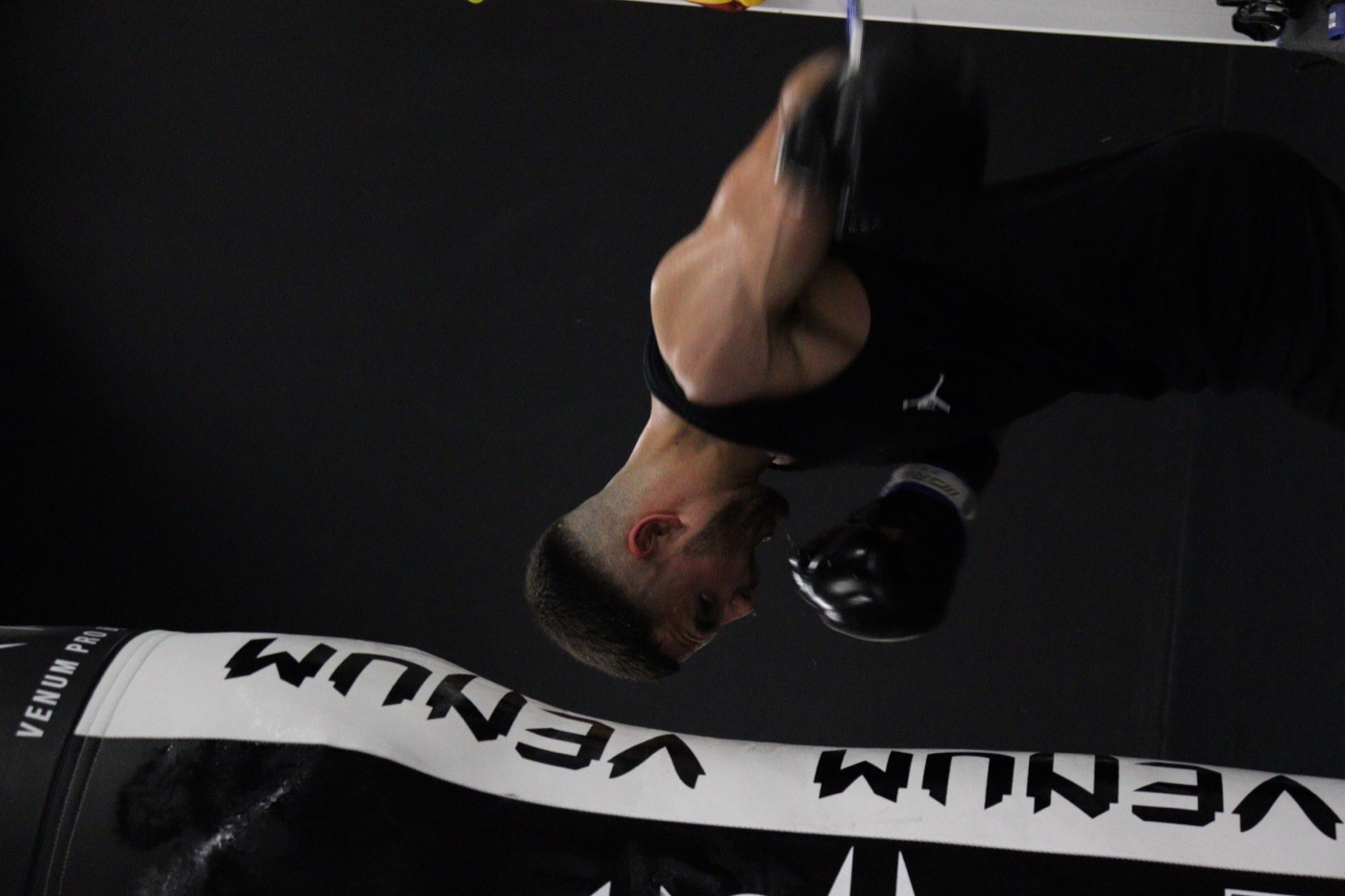 Luis working the heavy bag in the gym