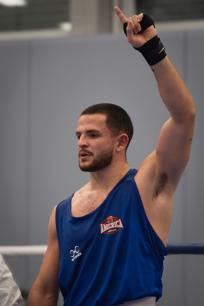 Hand raised after the win